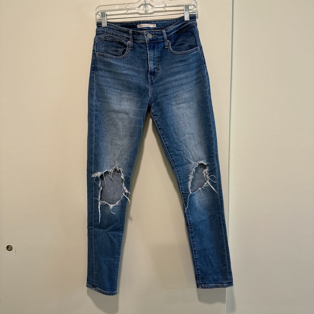 Levi’s 721 High Rise Skinny Ripped Jeans